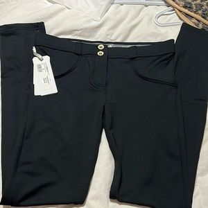 Black Freddy trousers soft and smooth pants with bum enhancing rear.